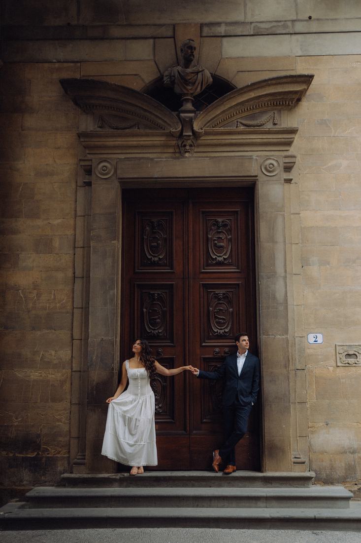 At a carved wooden door