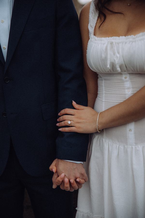 Nicole and Bennett holding hands